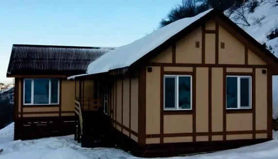 Дом из СИП-панелей с фасадом в стиле фахверк